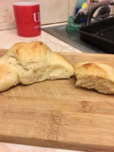 Croissant next to half a croissant